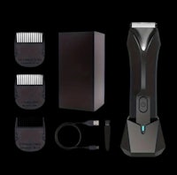a beard trimmer with a box and accessories
