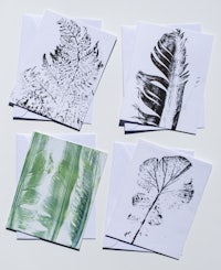 a set of greeting cards with leaves on them