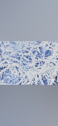 a blue and white painting on a gray background