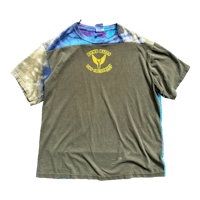 a tie dye t - shirt with an image of an eagle on it