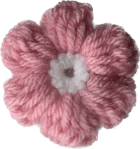a crocheted flower in pink and white