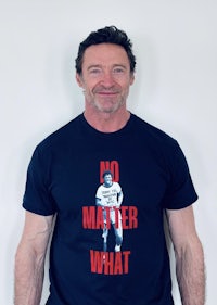 a man wearing a t - shirt that says no matter what