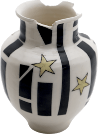 a black and white vase with stars on it