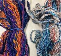 two skeins of yarn next to each other