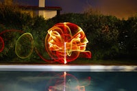 a light painting on a pool