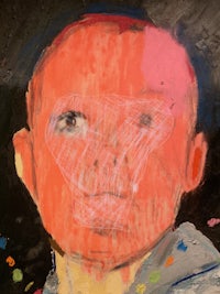 a painting of a child with red paint on his face