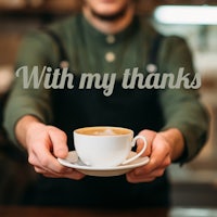 a man holding a cup of coffee with the words with my thanks