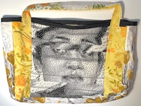 a tote bag with an image of a woman smoking a cigarette