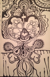 a black and white drawing of a cross