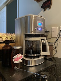 a coffee maker sitting on a counter top