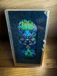 a clear case with an image of a dragon on it