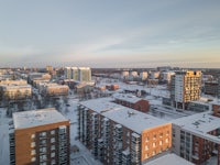an aerial view of a city in the winter