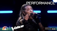 a woman singing on the voice