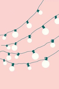 christmas lights on a pink background