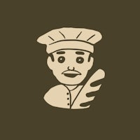 a man in a chef hat is holding a loaf of bread