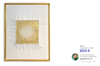 a white and gold painting with a gold frame