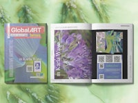 a magazine with a purple flower and a qr code