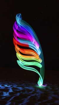 a colorful light painting on the sand