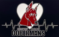 the logo for recovery road dobermans
