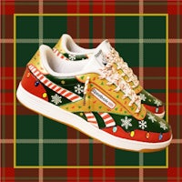 a pair of reebok christmas sneakers on a tartan pattern