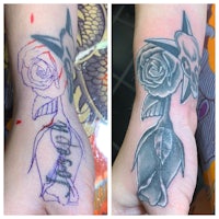a tattoo of a rose and a bird on a person's wrist