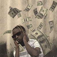 a man in sunglasses with money falling from his head