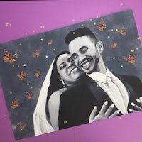 a wedding card with a bride and groom surrounded by butterflies