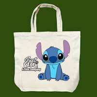 a tote bag with a stitch character on it