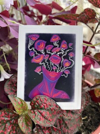 a card with purple and pink flowers on it
