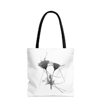 a black and white image of a flower tote bag