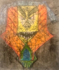 a drawing of a face on a concrete wall