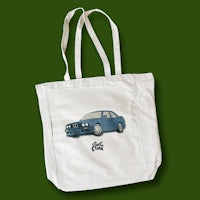 a tote bag with a blue car on it