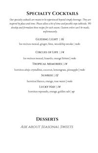 a black and white menu with the words speciality cocktails and desserts