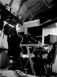 a black and white photo of a gaming room
