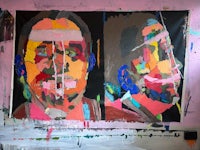 a painting of two faces on a pink background