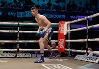 a male boxer in a boxing ring