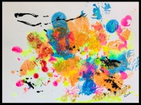 a painting with colorful splatters on a white background