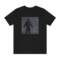 a black t - shirt with a picture of a man in a hoodie