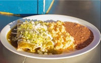 a plate of mexican food on a table