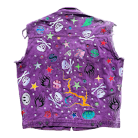 a purple vest with skulls and stars on it