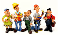 a group of figurines of construction workers