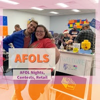 a group of people standing in front of a sign that says afol nights