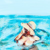 a woman is swimming in the ocean with a hat on