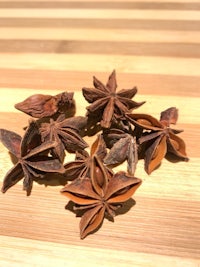 star anise seeds on a wooden table
