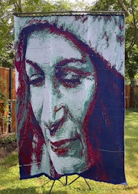 a blanket with a woman's face on it
