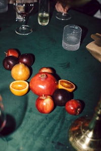 a table with a bunch of fruit on it