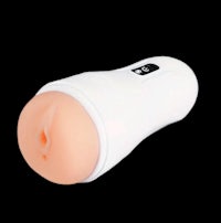 a white and pink sex toy on a black background