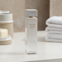 a bottle of white orchid edp sitting on a counter