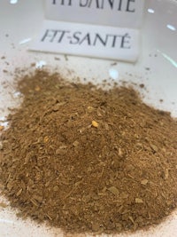 a bowl of powder with the word fit sante on it