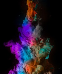 an image of colorful ink on a black background
